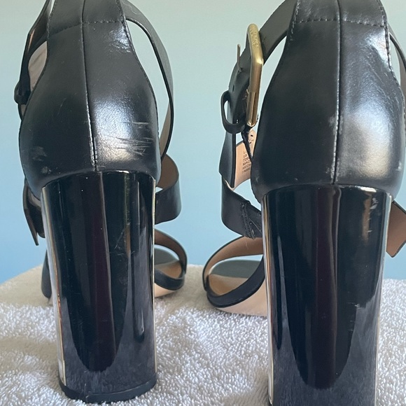 Calvin Klein- Black high heel. Heel is clear lined with a strip of gold. - Picture 2 of 7